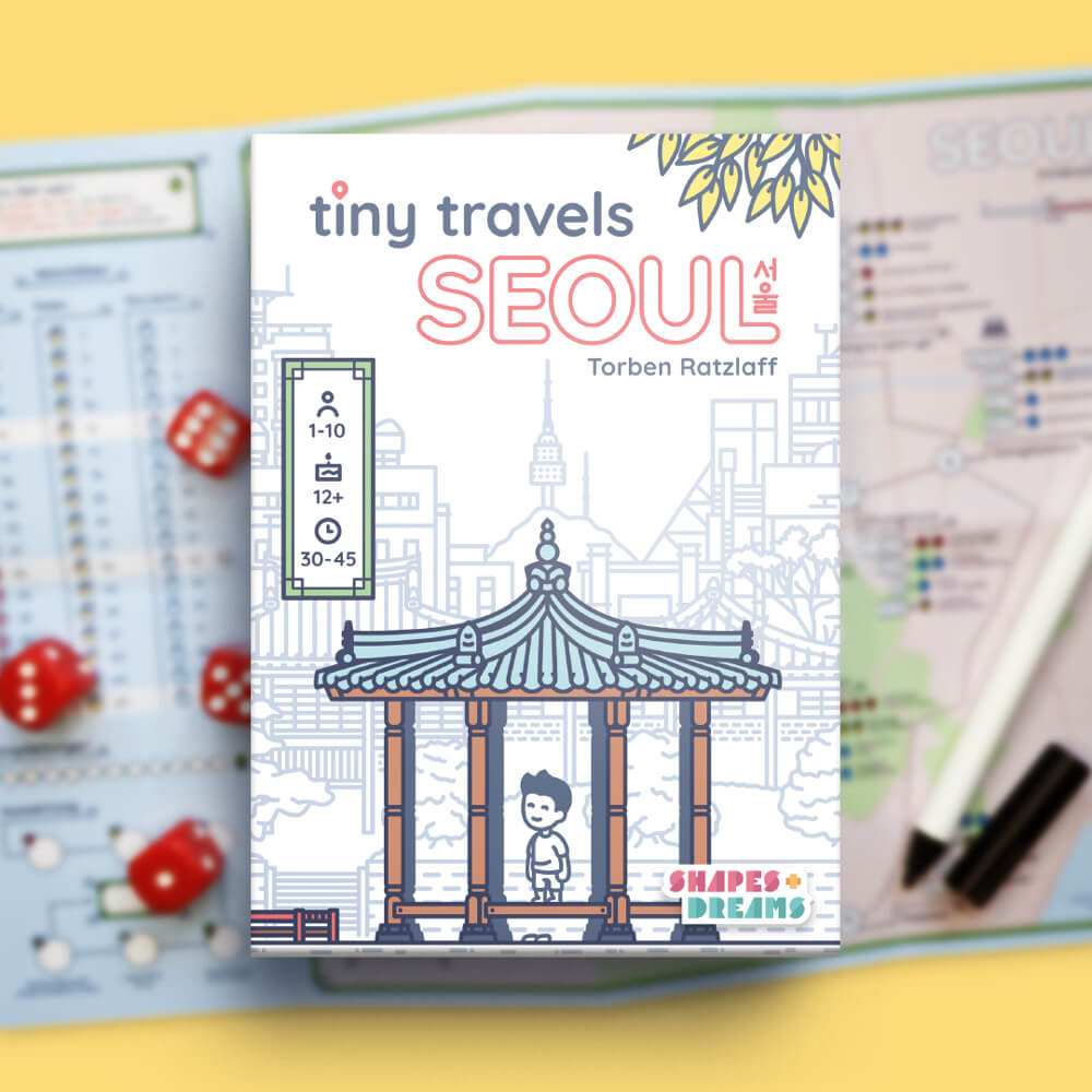 The Tiny Travels cover, depicting a person standing in a korean pavillon in front of the skyline of Seoul. In the background is a game sheet, four red dice and a pen.