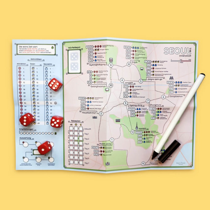 The Tiny Travels gamesheet, depicting a city map of Seoul with various locations on it. Four red dice and a pen lie on top.